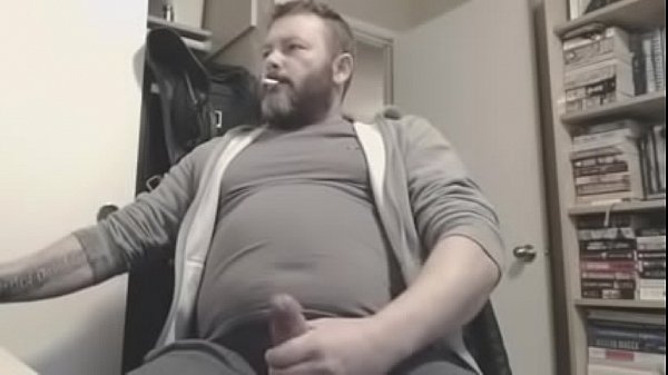 Bear jerking off while smoking