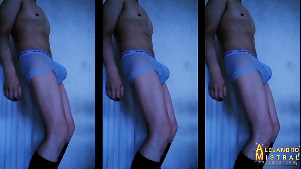 ALEJANDRO MISTRAL takes off his clothes, leaving his boxers on to get wet and rub his erect cock and testicles on top