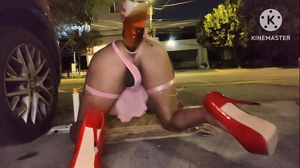 Shemale in pink lingerie taking 1l enema in the street